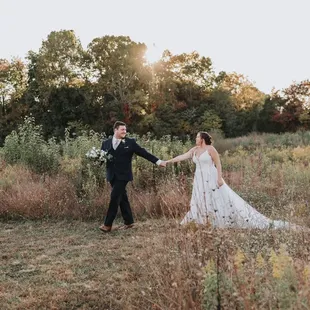 Bride and groom in the field