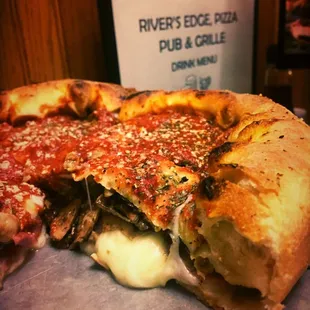 Melting mozzarella some of the guts of the Chicago Style pizza