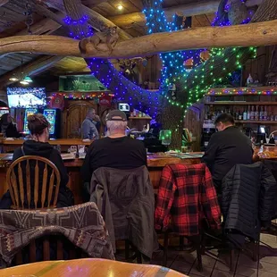 people sitting at the bar