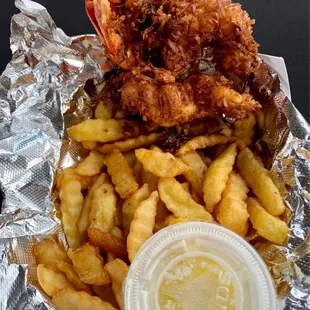 Lobsicle (Hand battered coconut fried lobster tail) ftom Island Girl Seafood