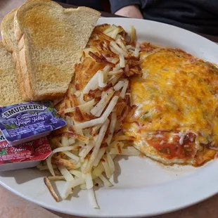 Huevos rancheros - two perfectly cooked eggs under that delicious cheese