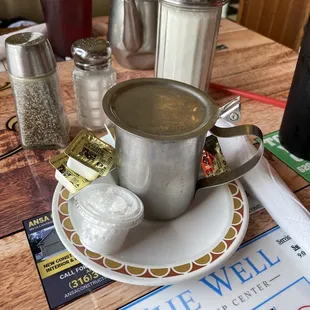 a cup of coffee on a saucer