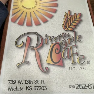 the sign for riverside cafe