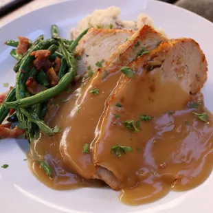 Sliced turkey breast, our signature mashed potatoes and green beans with bacon