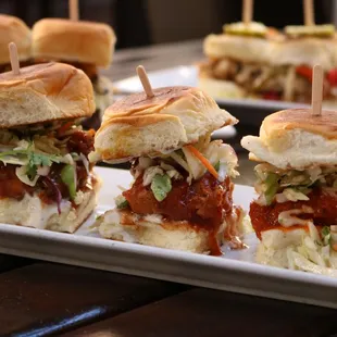 Chicken Trio Sliders: Buffalo, Honey Sriracha and Carolina BBQ sauces.