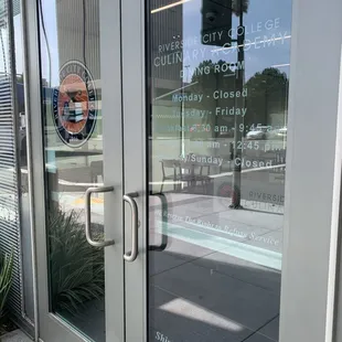 Hours on the front door