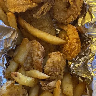 Fish, shrimp And fries half of the meal was reheated the next day and it tasted amazing.