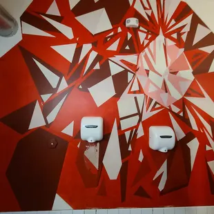 Can't miss the hand dryers on the wall in the ladies' room!