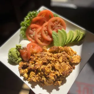Chorizo &amp; Egg Plate (minus rice &amp; beans &amp; tortillas) add sliced tomatoes &amp; sliced avocado.