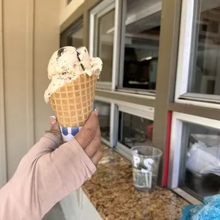Ice cream in a waffle cone.
