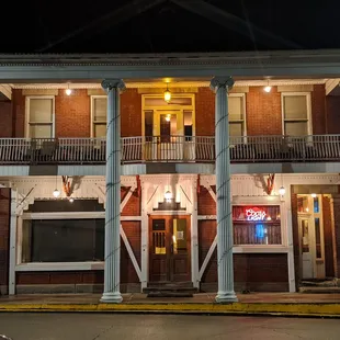 the front of the hotel at night