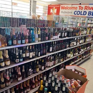 a large selection of alcohol in a store