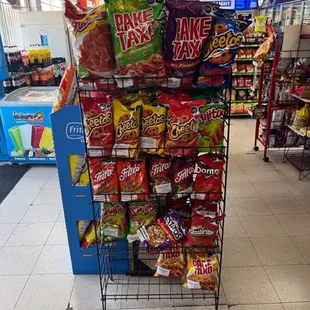 a display of chips and other snacks