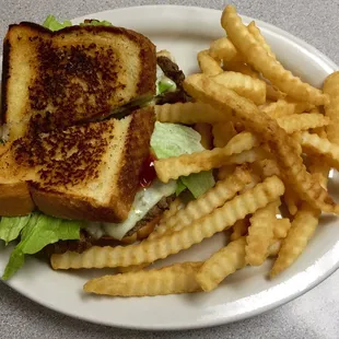 Riverside burger on garlic toast w/ pepper jack &amp; bacon.