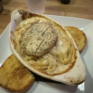 Fettuccine Alfredo with chicken and garlic bread. Just ok.