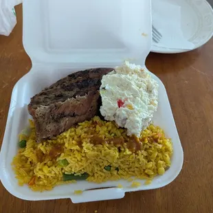 Ribs with yellow rice and potato salad - a whopping 7.99! What a bargain!