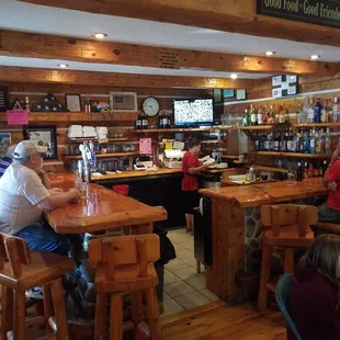 customers sitting at the bar
