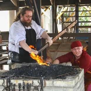 Antares Guild Members working the forge at Koroneburg Renaissance Festival