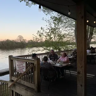 The outdoor patio seating is so peaceful on the waterfront