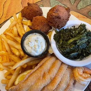 Catfish, fries, hush puppies and turnip greens