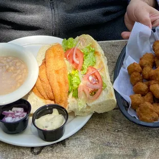 Catfish po-boy with fried okra and white beans. Delicious.