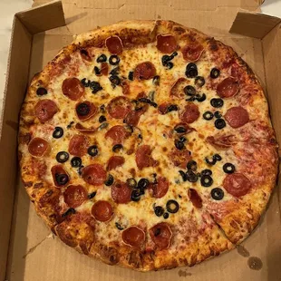 a pepperoni and olive pizza