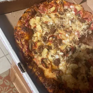 Supreme pizza (no ham sub Italian sausage and add pineapple )
