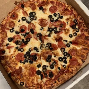 Favorite local pizza place.  Large pepperoni and black olive.