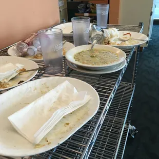 Dirty dishes right in the dining space. Notice the bowl of soup-untouched.