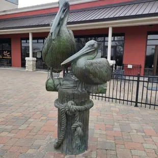 Bronze pelican statue