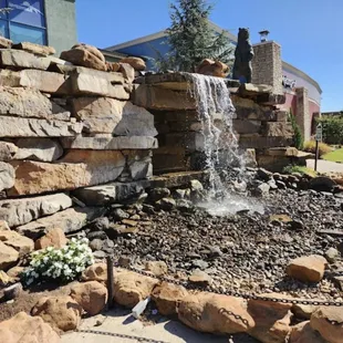 Waterfall at Entry. You can take photos behind the fall! Super cool!