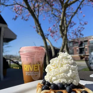 Raspberry coconut sweet cream cold brew, blueberry waffle with lemon whip on top