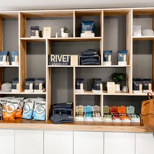 Merchandise -- grab a bag of coffee to enjoy at home for the week!