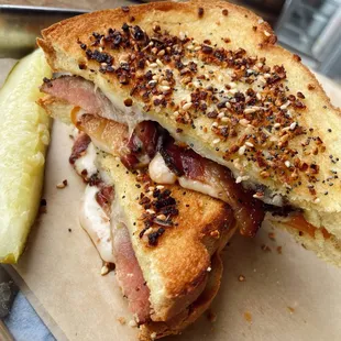 The MacDill Grilled Cheese - Cheddar, Swiss, Provolone, Applewood smoked bacon, Brioche, everything bagel seasoning.
