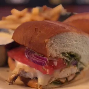 Pesto chicken sandwich with garlic fries