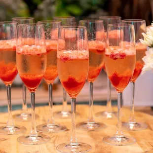 a row of glasses of champagne