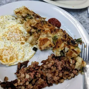 Delicious corn beef hash with side of polish sausage