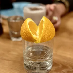 Tequila with orange wedge chaser