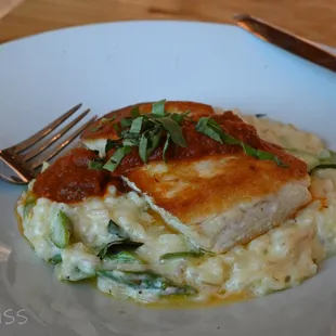 tender and tasty Sea bass on a bed of creamy risotto