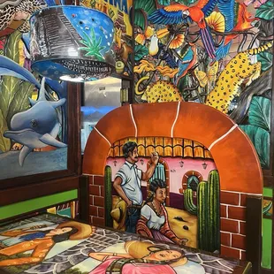 hand carved and painted walls, seating, tables, chairs &amp; light fixtures