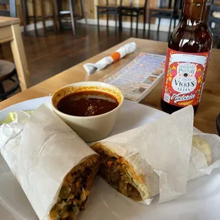 Birria de Res burrito. Victoria beer.