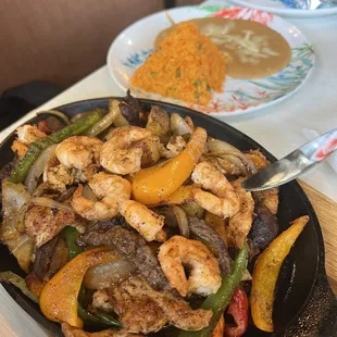 Chicken, shrimp and carne fajitas
