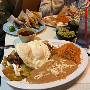 Chilaquiles with over 2 easy eggs