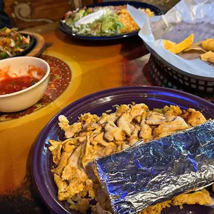a burrito and other mexican food