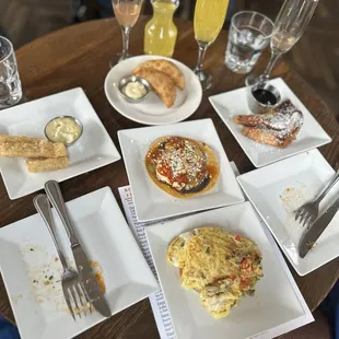 Mimosas  Fried Yuca  Tortilla de Huevo con Pollo French Toast  Huevos Rancheros