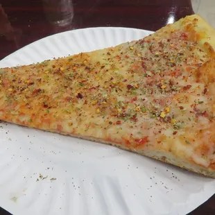 Sad excuse for pizza on May 7, 2024 at Rivoli II in the West Village.