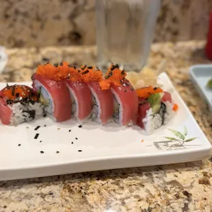 a plate of sushi on a table