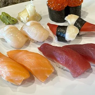 Ikura Nigiri, Scallop Nigiri, Smoked Salmon Nigiri, Tuna Nigiri, Surf Shell Clam Nigiri