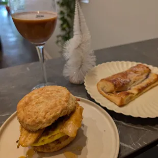 Espresso martini, famous chicken waffle, rolled blueberry croissant