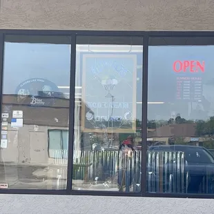 the reflection of a car in the window